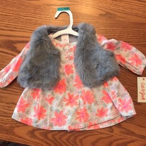 Floral top and faux fur vest